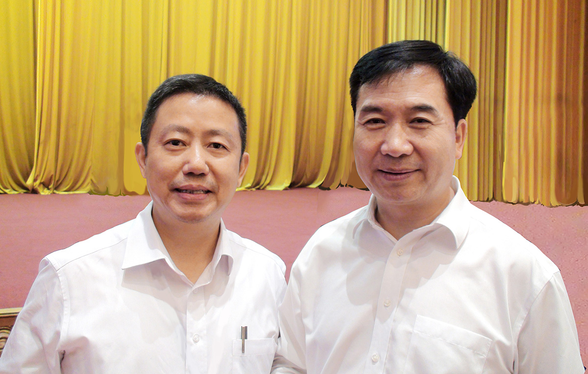 中央政治局常委、中央纪律检查委员会书记李希与周海江合影